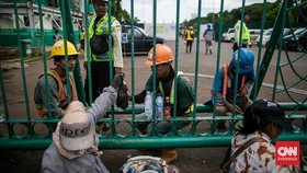 FOTO: Wajah Pekerja Sektor Informal di Tengah Kejam Kehidupan Jakarta