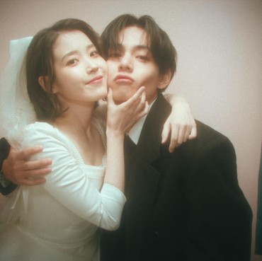 Penampilan IU dan V BTS Jadi Pasangan Pengantin dalam MV 'Love Wins All'