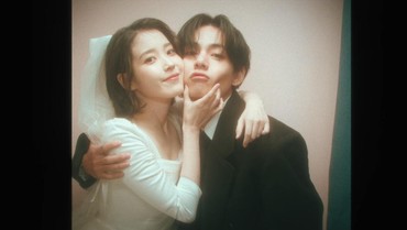 img-title Penampilan IU dan V BTS Jadi Pasangan Pengantin dalam MV 'Love Wins All'