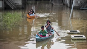 FOTO: Banjir Rendam Sejumlah Wilayah di Jambi