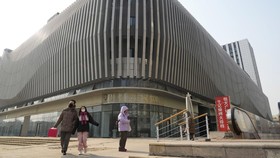 FOTO: Babak Baru Krisis Properti China, Evergrande Dilikuidasi