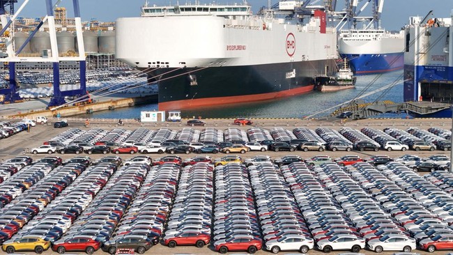 (FILES) This file photo taken on January 10, 2024 shows electric cars for export waiting to be loaded on the 