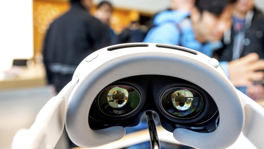 Mohamed Jawad shows off his Vision Pro headset on the first day of sales at a Palo Alto, Calif., Apple Store on Friday, Feb. 2, 2024. Jawad, who described himself as an 