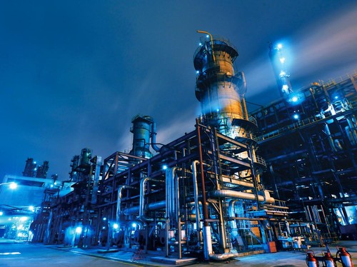 Oil Refinery, Chemical & Petrochemical plant abstract at night.