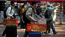 FOTO: Warga China Mulai Mudik Massal Jelang Imlek