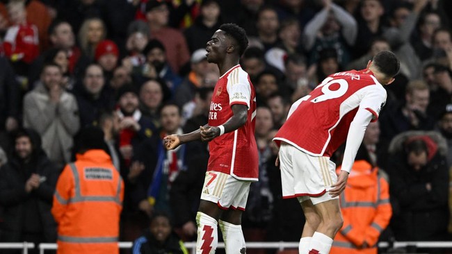 Legenda Manchester United, Rio Ferdinand menegaskan bintang Arsenal, Bukayo Saka bukan pemain kelas dunia.