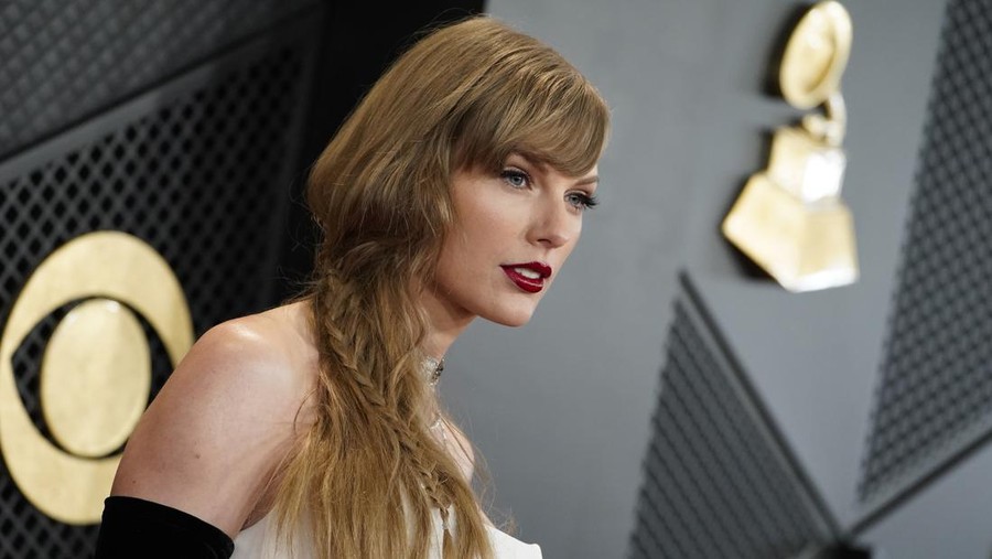 Taylor Swift arrives at the 66th annual Grammy Awards on Sunday, Feb. 4, 2024, in Los Angeles. (Photo by Jordan Strauss/Invision/AP)