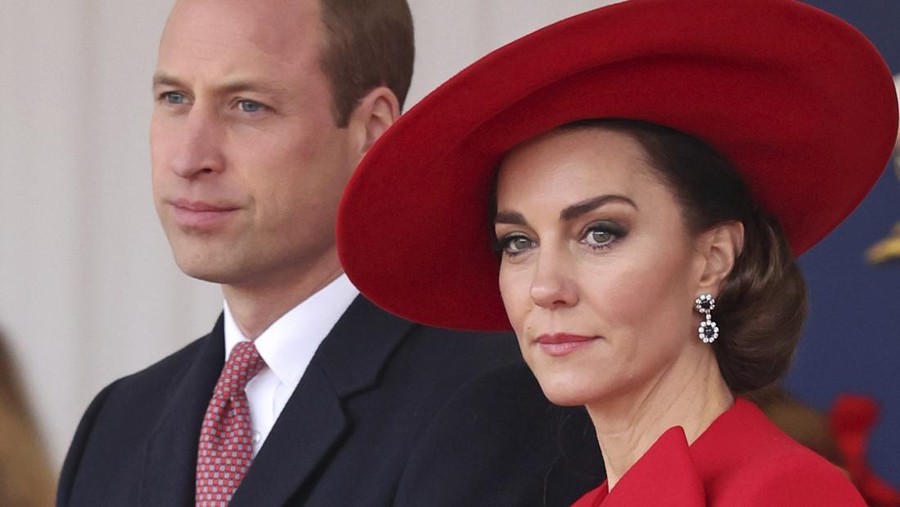 Britain King Impact FILE - Britain's Prince William, left, and Britain's Kate, Princess of Wales, attend a ceremonial welcome for the President and the First Lady of the Republic of Korea at Horse Guards Parade in London, England on Nov. 21, 2023. Charles' illness comes at a awkward time, as his daughter in law, the Princess of Wales, has also had her own health issues, having recently been hospitalized for two weeks following abdominal surgery following at the private London clinic. The former Kate Middleton won't be returning to public duties until after Easter and that will prompt other members of the royal family to pick up the slack.(Chris Jackson/Pool Photo via AP, File)