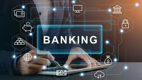 Electronic banking concept. Businessman using online financial service on tablet computer, creative collage with pictograms