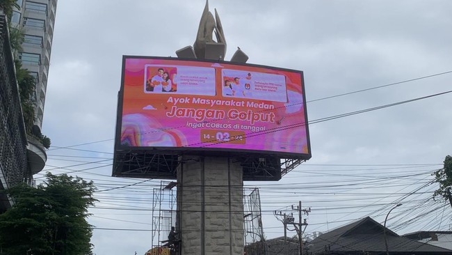 Iklan ajakan jangan golput di aset Pemkot Medan terlihat desainnya menonjolkan angka 02.