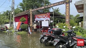 Tiga TPS di Gresik Terendam Banjir, Warga Tetap Mencoblos di Lokasi