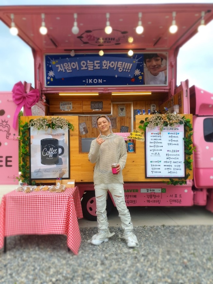 In October 2023, Bobby iKON made a comeback with an album entitled 'ROBERT'.  In order to provide support to the main rapper, iKON members gave a pink Coffee Truck with the words 