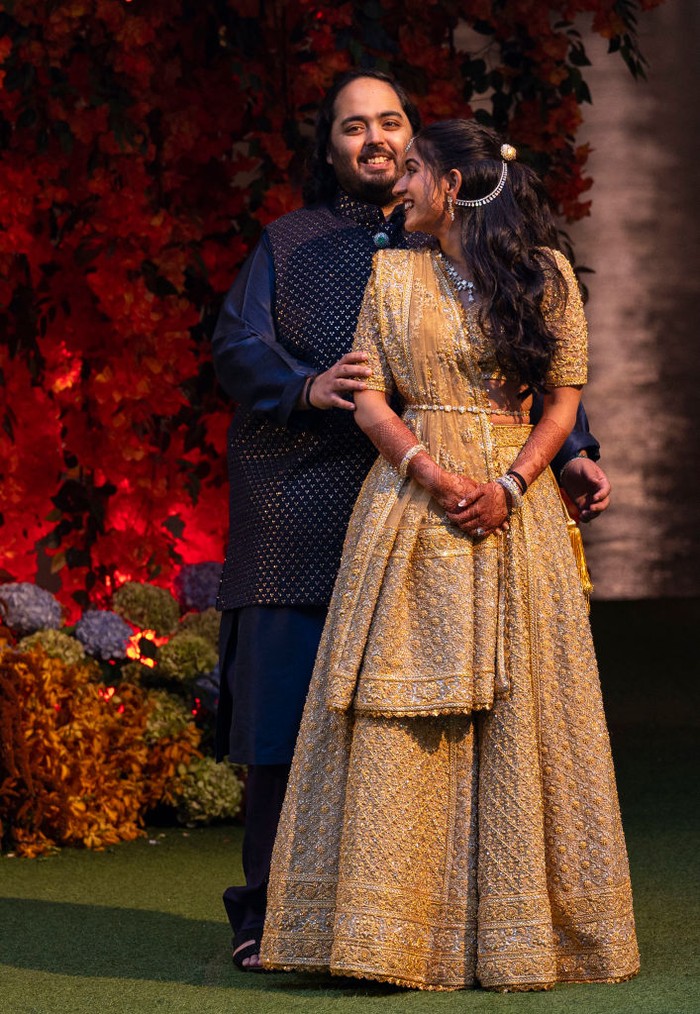 MUMBAI, INDIA - JANUARY 19: Radhika Merchant and Anant Ambani pose for the media during their engagement, at Antilia  on January 19, 2023 in Mumbai, India. (Photo by Anshuman Poyrekar/Hindustan Times via Getty Images)