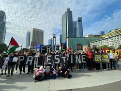 Sejumlah Masyarakat Gelar Aksi Bela Palestina di CFD Jakarta
