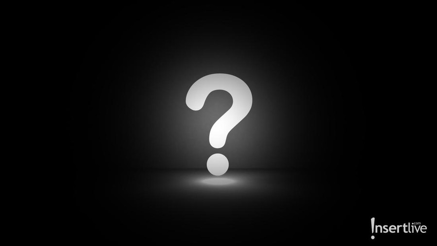 Question mark drawn on wooden jigsaw puzzle