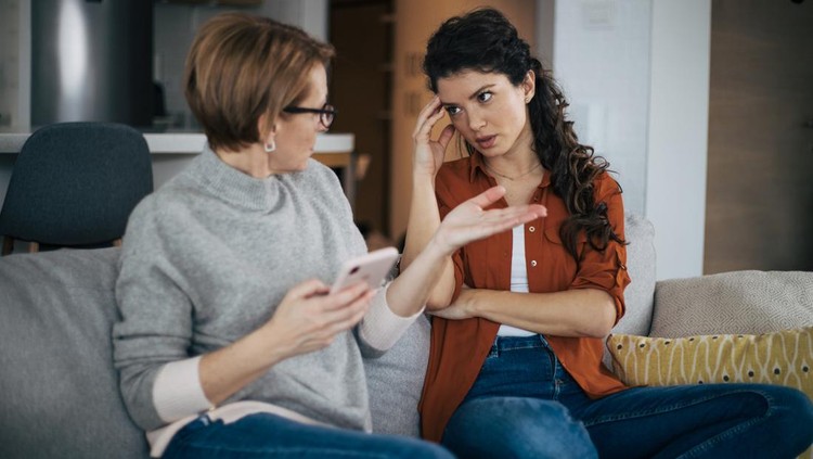 1419281546 Young woman is arguing with her mother