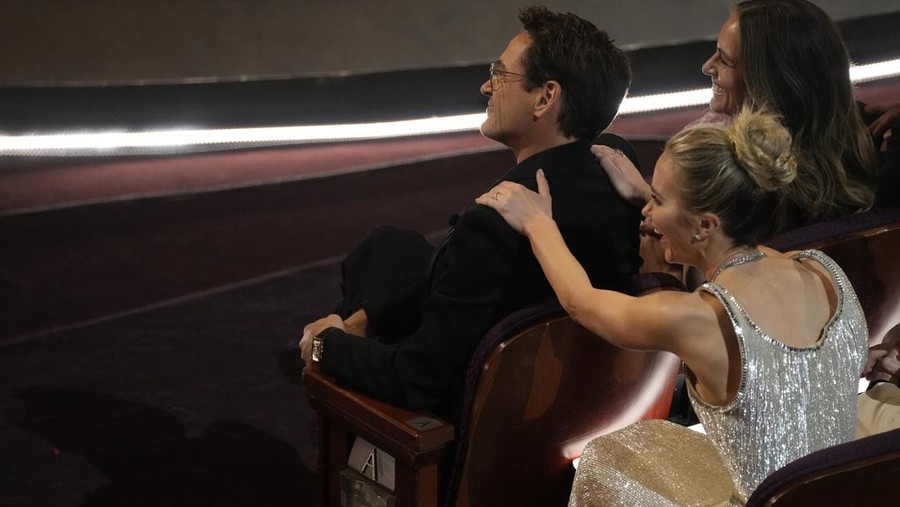 Robert Downey Jr., left, and Emily Blunt appear in the audience during the Oscars on Sunday, March 10, 2024, at the Dolby Theatre in Los Angeles. (AP Photo/Chris Pizzello)