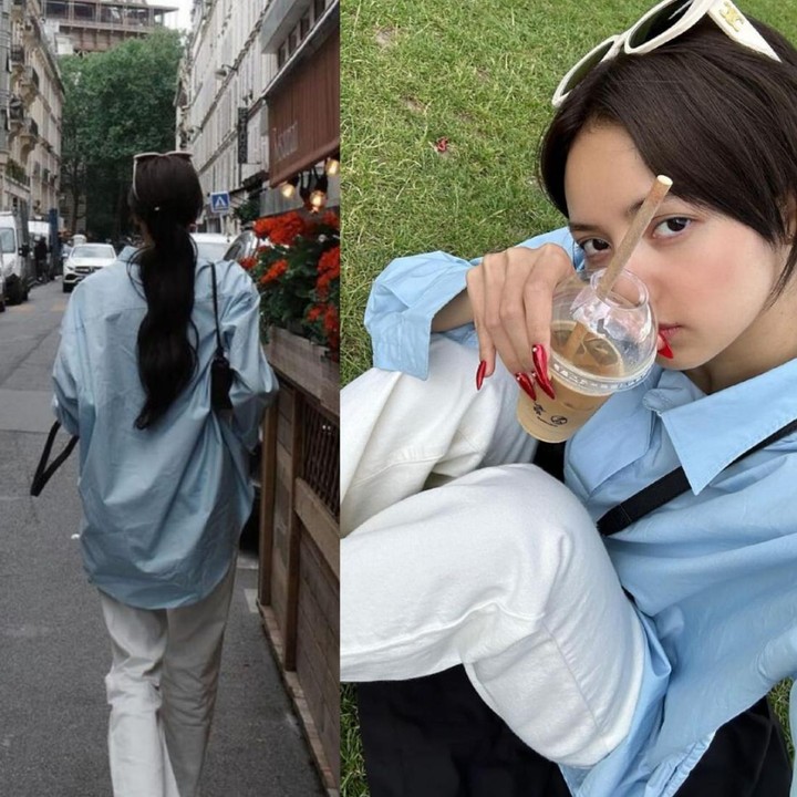 <p>Kali ini Lisa yang sedang jalan-jalan di Prancis, tampil kasual dengan <em>oversized shirt</em> biru dipadukan dengan celana putih dan <em>shoulder bag</em> hitam. (Foto: Instagram @lalalalisa_m)</p>