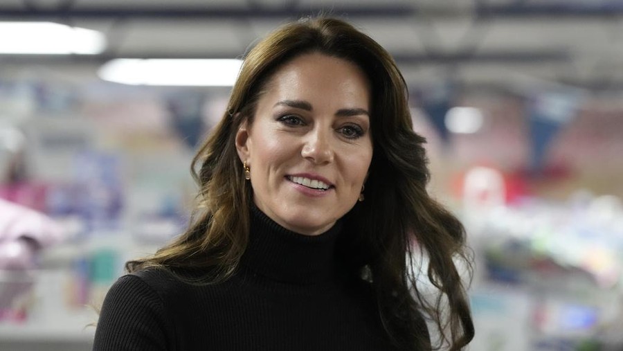 FILE - Britain's Kate, Princess of Wales smiles during her visit to Sebby's Corner in north London, Friday, Nov. 24, 2023. Princess Kate apologized Monday, March 11, 2024 for “confusion” caused by her editing of a family photo released by the palace — an image of the British royal and her children that was intended to calm concern and speculation about the princess's health, but had the opposite effect.  (AP Photo/Frank Augstein, Pool, File )