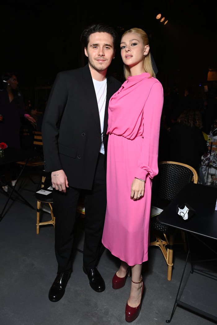 PARIS, FRANCE - OCTOBER 01: (EDITORIAL USE ONLY - For Non-Editorial use please seek approval from Fashion House) Brooklyn Beckham and Nicola Peltz attend the Valentino Womenswear Spring/Summer 2022 show as part of Paris Fashion Week on October 01, 2021 in Paris, France. (Photo by Pascal Le Segretain/Getty Images)
