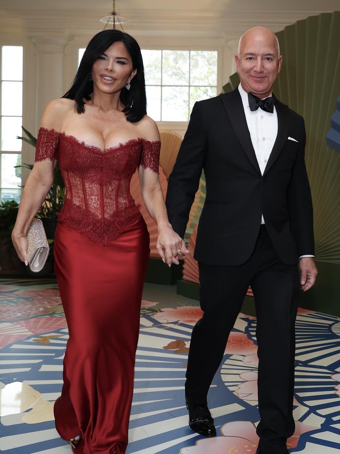WASHINGTON, DC - APRIL 10: Amazon founder Jeff Bezos (R) and his fiancee Lauren Sanchez arrive at the White House for a state dinner on April 10, 2024 in Washington, DC. U.S. President Joe Biden and first lady Jill Biden are hosting a state dinner for Japanese Prime Minister Fumio Kishida as part of his official state visit.  (Photo by Tasos Katopodis/Getty Images)