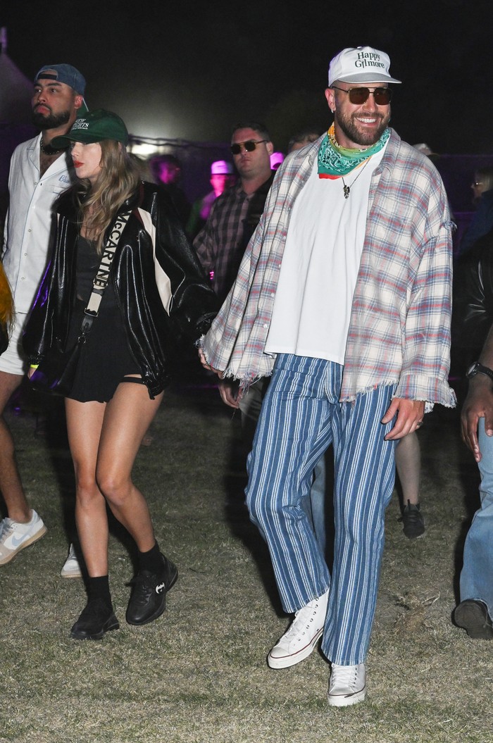Taylor Swift and Travis Kelce at Neon Carnival held during the Coachella Music and Arts Festival on April 13, 2024 in Thermal, California. (Photo by Gilbert Flores/WWD via Getty Images)