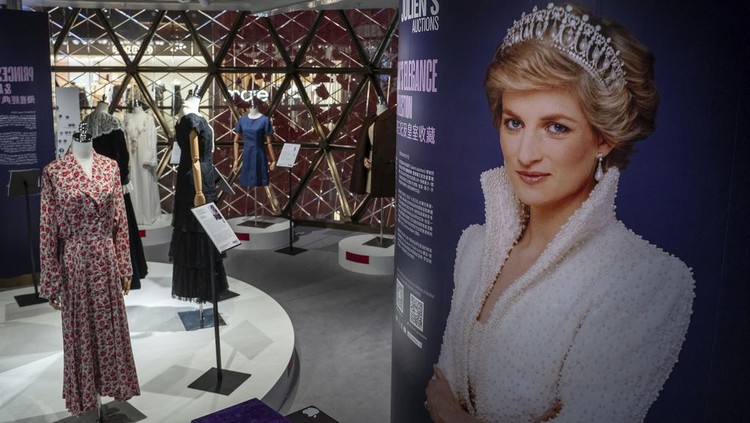 Dresses worn by Princess Diana are displayed at the media preview ahead of the auction of the Princess Diana's Elegance & A Royal Collection in Hong Kong, Wednesday, April, 17, 2024. (AP Photo/Vernon Yuen)