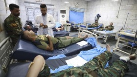 FOTO: Menyelamatkan Pasukan Irak dari Ledakan Pangkalan Militer