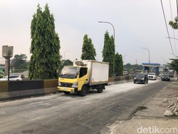 Perbaikan Jalan Dekat Terminal Kampung Rambutan Selesai, Lalin Kembali Normal