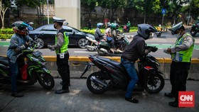 Polisi Lepas Pelanggar Lalu Lintas Bila Lancar Membaca Al-Qur'an