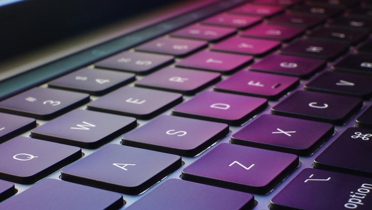 ilustrasi keyboard closeup of keyboard with puple and colorful background, technology and information
