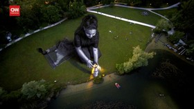 VIDEO: Seniman Swiss Lukis Gadis Raksasa, Pesan untuk Migran