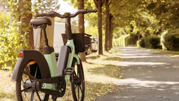Bike Rent e-bicycle in Park Street. Electric Bicycle sharing Service. Electric bike in urban Space Background.