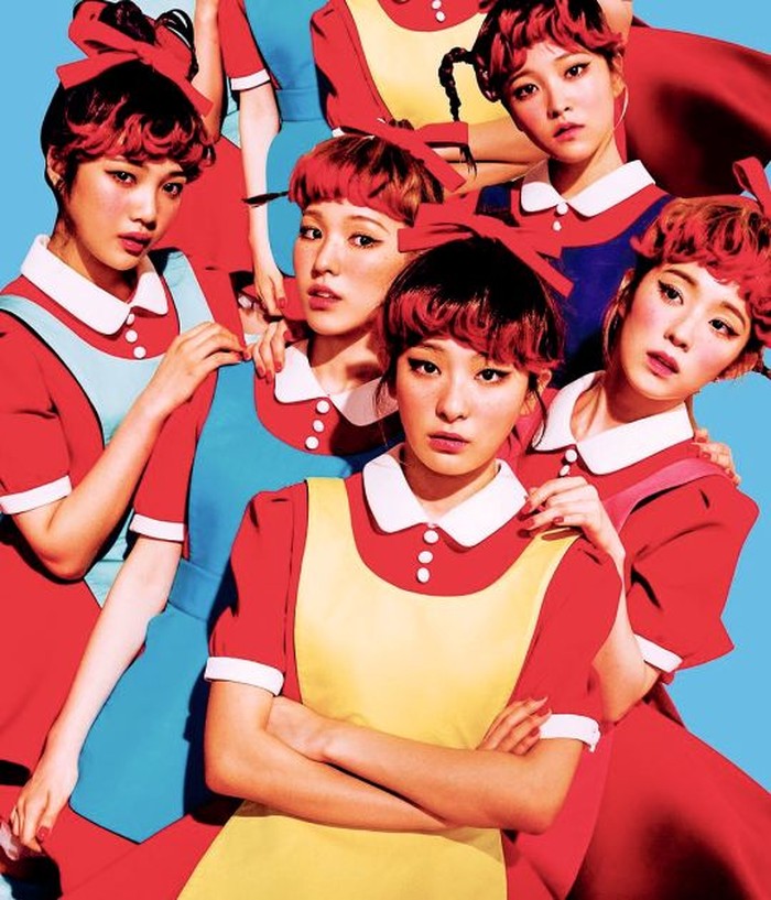Dalam MV ‘Dumb Dumb’ Red Velvet layaknya boneka, ke-lima anggota tampil dengan rambut di kuncir, disertai pita besar di atasnya. Baju merah dan sentuhan ‘Chevron’ membuat mereka tampak lucu./Foto: Wikipedia