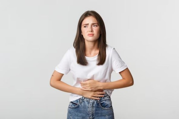 Ilustrasi perempuan sedang lapar /Foto: Freepik/benzoix