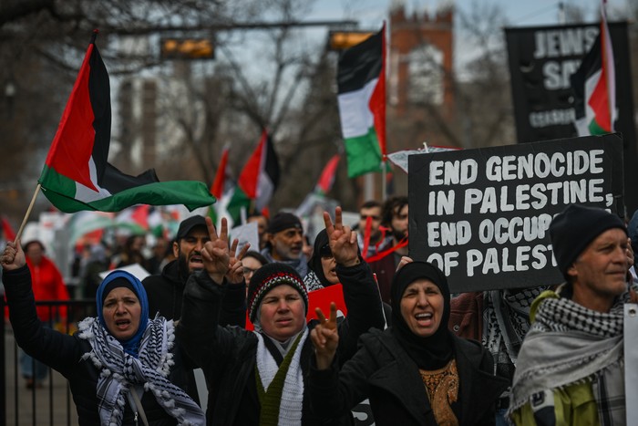 EDMONTON, CANADA - APRIL 27:
Members of the Palestinian diaspora, supported by the local Muslim community and activists from left-wing parties, including the Communist Party of Canada, rally for Gaza under the banner 'End Genocide Now' through Edmonton's Whyte Avenue, on April 27, 2024, in Edmonton, Alberta, Canada. (Photo by Artur Widak/NurPhoto via Getty Images)