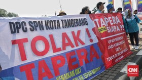 FOTO: Demo Buruh Tolak Tapera di Patung Kuda