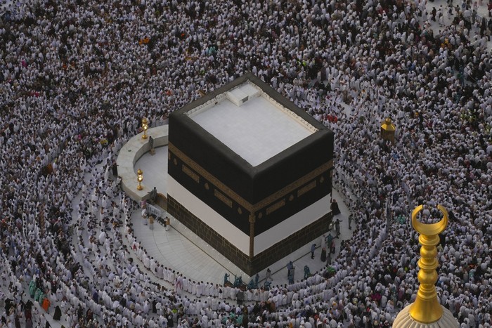 Muslim pilgrims circumambulate the Kaaba, the cubic building at the Grand Mosque, during the annual Hajj pilgrimage in Mecca, Saudi Arabia, Tuesday, June 11, 2024. (AP Photo/Rafiq Maqbool)