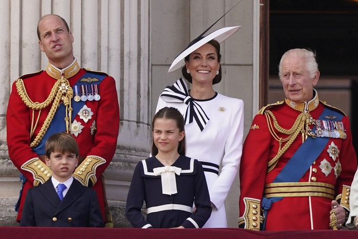 Prince William, and Kate Princess of Wales on the balcony of Buckingham Palace with their children Prince George, left, Prince Louis, front centre, and Princess Charlotte wave to the crowds after the Trooping the Color ceremony, in London, Saturday, June 15, 2024. Trooping the Color is the King's Birthday Parade and one of the nation's most impressive and iconic annual events attended by almost every member of the Royal Family. (AP Photo/Alberto Pezzali)