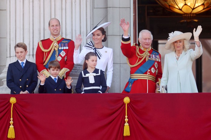 LONDON, ENGLAND - JUNE 15: Prince George of Wales, Prince William, Prince of Wales, Prince Louis of Wales, Princess Charlotte of Wales, Catherine, Princess of Wales, King Charles III and Queen Camilla during Trooping the Colour at Buckingham Palace on June 15, 2024 in London, England. Trooping the Colour is a ceremonial parade celebrating the official birthday of the British Monarch. The event features over 1,400 soldiers and officers, accompanied by 200 horses. More than 400 musicians from ten different bands and Corps of Drums march and perform in perfect harmony. (Photo by Chris Jackson/Getty Images)