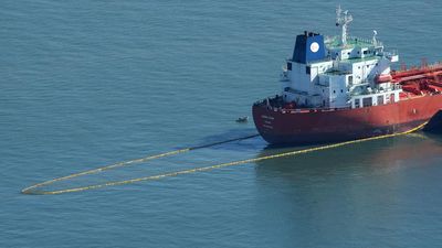 SAN FRANCISCO - OCTOBER 30: An oil boom extends from the rear of the oil tanker Dubai Star as it sits anchored in the San Francisco Bay October 30, 2009 in San Francisco, California. The Panamanian-fl