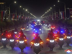 Foto Putin-Bendera Rusia di Pyongyang Menyambut Kunjungan Langka