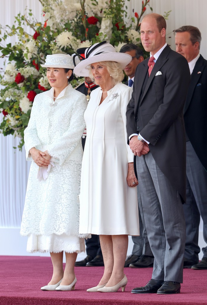 LONDON, ENGLAND - JUNE 25: Queen Camilla (C) with Empress Masako of Japan and Prince William, Prince of Wales (R) at the ceremonial welcome during the state visit to the United Kingdom at Horse Guards Parade on June 25, 2024 in London, England. (Photo by Chris Jackson/Getty Images)