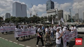 FOTO: Jeritan Pekerja Tekstil Indonesia Terancam Hilang Mata Pencarian