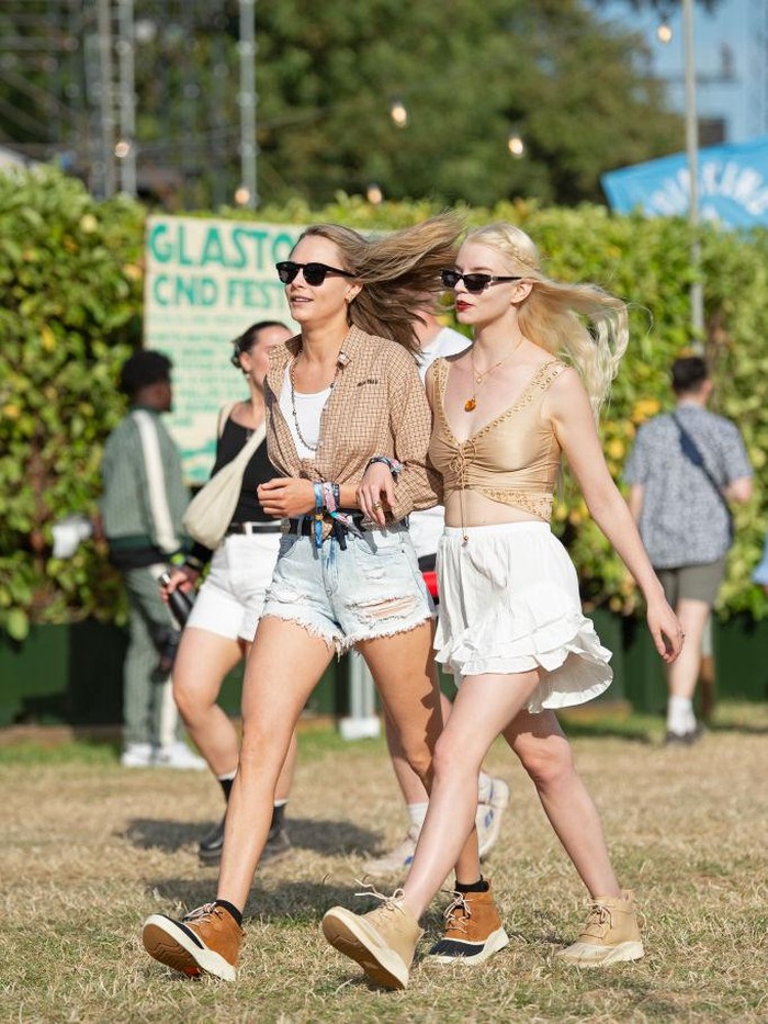 GLASTONBURY, ENGLAND - JUNE 28: Cara Delevingne and Anya Taylor-Joy attend day one of the Glastonbury Festival on June 28, 2024 in Glastonbury, England. (Photo by Dave Benett/Getty Images)