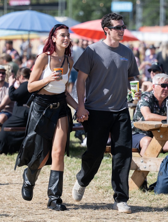 GLASTONBURY, ENGLAND - JUNE 29: Dua Lipa and Callum Turner during day four of Glastonbury Festival 2024 at Worthy Farm, Pilton on June 29, 2024 in Glastonbury, England. Founded by Michael Eavis in 1970, Glastonbury Festival features around 3,000 performances across over 80 stages. Renowned for its vibrant atmosphere and iconic Pyramid Stage, the festival offers a diverse lineup of music and arts, embodying a spirit of community, creativity, and environmental consciousness. (Photo by Samir Hussein/WireImage)