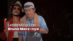 img-title Heboh Tukang Parkir Mirip Bruno Mars, Netizen: Buat Persiapan Konser
