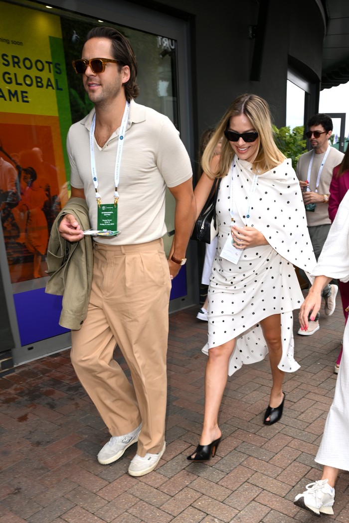 LONDON, ENGLAND - JULY 12: Margot Robbie attends day twelve of the Wimbledon Tennis Championships at the All England Lawn Tennis and Croquet Club on July 12, 2024 in London, England. (Photo by Karwai Tang/WireImage)