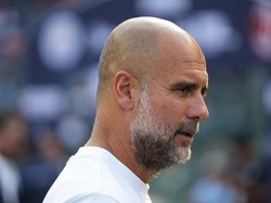Tinju Amukan Pep Guardiola