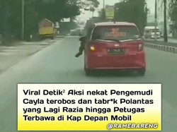 Bak Film Action! Pemobil Tabrak Polisi-Nyangkut di Atas Kap Diburu Patwal